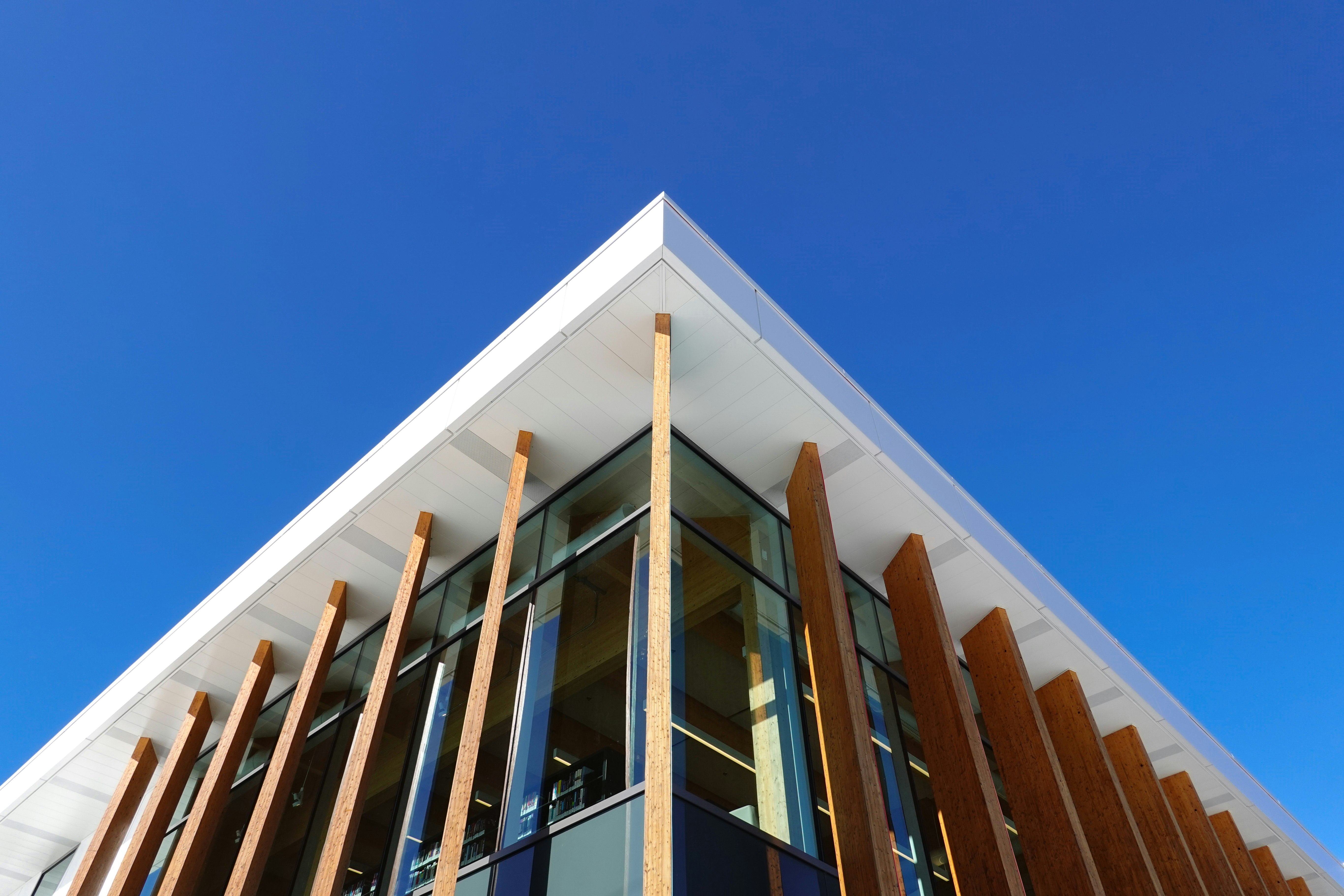 white and brown concrete building under blue sky during daytime